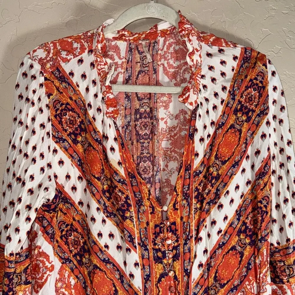 Free People Magic Mystery Tunic with bell sleeves split neck button front size M